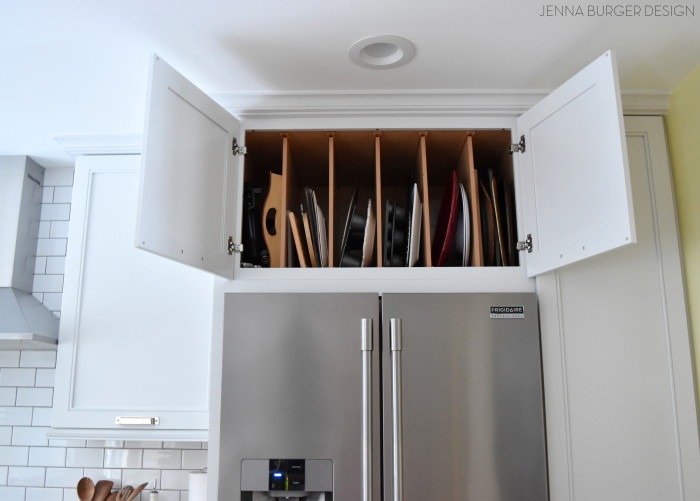 Full depth cabinet above the refrigerator with Vertical Dividers, perfect for trays, cookies sheets, and more!